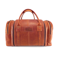 Tobacco brown waxed full-grain leather travel bag by Der Lederhandler with stiff construction
