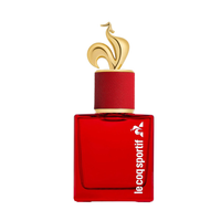 Le Coq Sportif Rouge Énergie eau de parfum bottle with vibrant red packaging